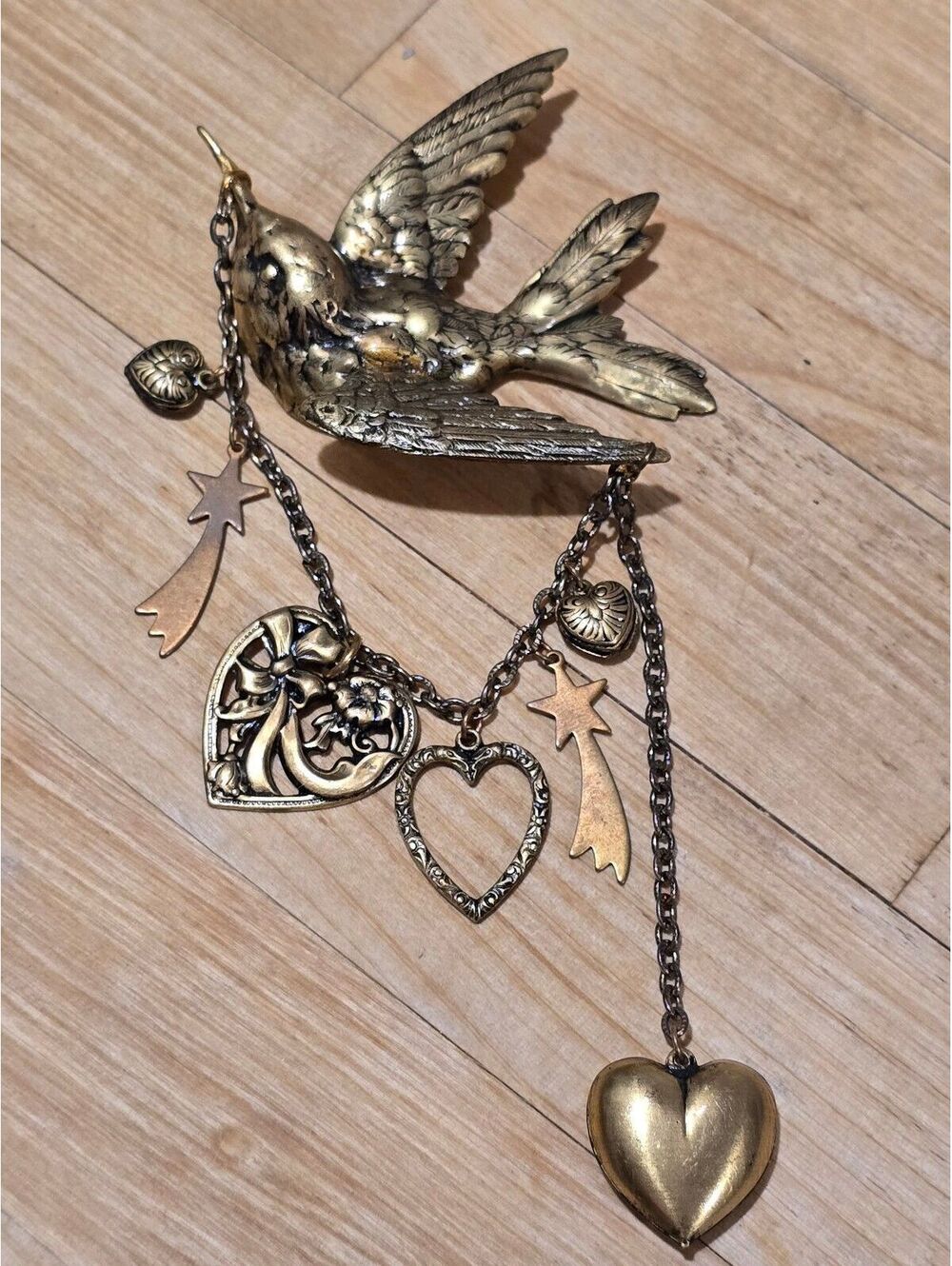Vtg Bird Brooch Bird Carrying a Chain of Hearts and Shooting Stars RARE